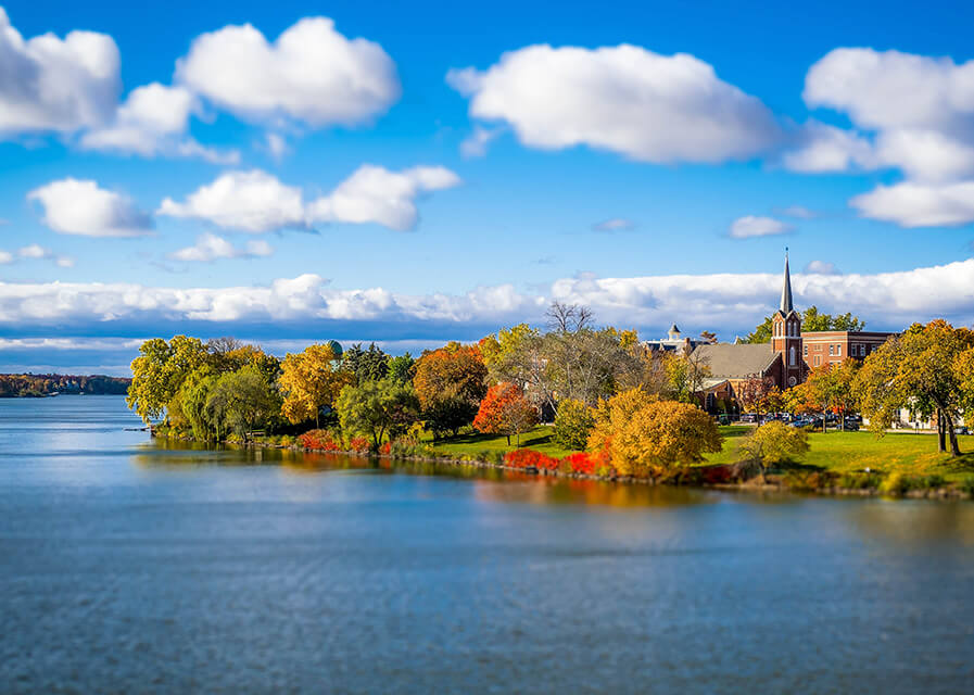 A water view of St. Norbert College on the Fox River in De Pere.