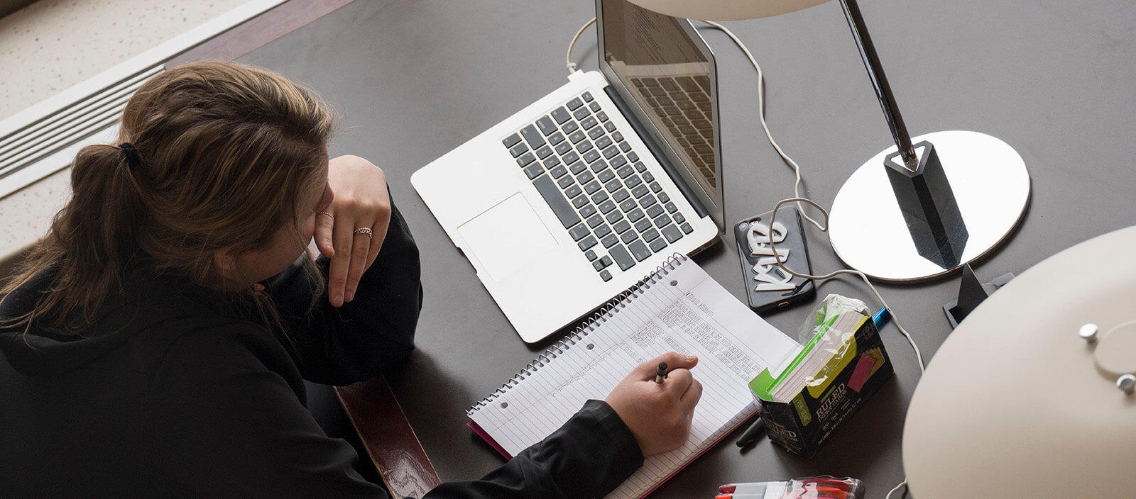 Student working on a laptop