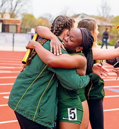 Student athletes hugging