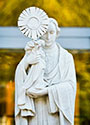 St. Norbert statue in front of Old St. Joe's