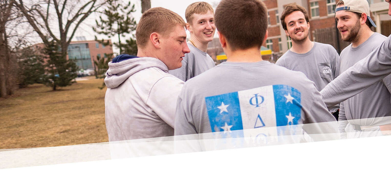 Fraternity brothers in a circle